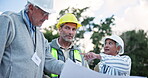 People, group and architect with blueprint at construction site for floor plan, discussion and building development. Contractors, documents and talk, inspection and teamwork for industrial project