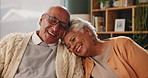 Love, laughing or old couple in home to relax, hug or enjoy funny joke together in retirement for peace. House, senior woman or happy elderly man bonding with care, support or smile in living room