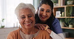 Happy woman, senior and patient with caregiver for elderly care, support or love in hug, embrace or trust at home. Portrait of female person or medical nurse with smile in assistance at old age house