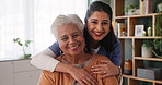 Happy woman, senior and patient with nurse for elderly care, support or love in hug, embrace or trust at home. Portrait of female person or medical caregiver with smile in assistance at old age house