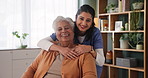 Happy woman, senior and patient with caregiver for hug, love or support in elderly care or embrace at home. Portrait of medical nurse or person with a disability in wheelchair for assistance at house