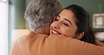 Happy woman, patient and hug with nurse in elderly care for support, help or love at old age home. Young medical caregiver or volunteer with client or smile for embrace, trust or thank you at house