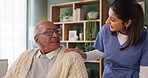 Senior man, nurse and talking with assistance for support, help or health advice at old age home. Woman, medical caregiver or volunteer speaking to patient for elderly care or retirement at house