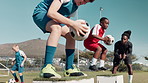 Soccer ball, exercise and team of kids with drill for coaching, practice or training for match. Boys, growth and children on field with teamwork for youth development, workout or outdoor sports skill