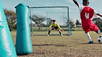 Soccer ball, sports and children with net for training, workout and exercise for practice, learning and fitness. Goal, field and kids with coach and equipment for playing games, match and competition