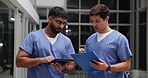 Clipboard, tablet and men doctors in hospital for discussion on medical diagnosis and treatment. Checklist, digital technology and team of healthcare employees walking and planning surgery in clinic.