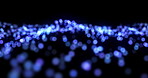 Animation, data flow and networking with blue particles on black background for communication. Connection, future and graphic with cloud computing or information technology stream in dark cyberspace