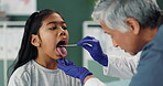 Depressor, kid and pediatrician check tongue for wellness, test or healthcare of people in medical hospital. Child, ent nurse or throat exam of girl for mouth, tonsils or otolaryngology with patient