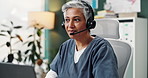 Senior woman, doctor and headset for video call, healthcare, support and virtual consultation in clinic. Mature medic, headphones and telehealth for online appointment, advice and insurance faq