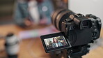 Camera, screen and review of headphones, digital and closeup of person in video, blogger and shooting. Home, talking and guide by girl, promotion and vlog for advice, live streaming and online