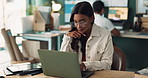 Indian woman, employee and glasses in office with laptop to search for ideas and information as market research specialist. Female person, confident and thinking on website or online for solution