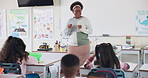 Teaching, black woman and teacher in classroom, conversation and learning with whiteboard. African person, creativity and educator with information, share knowledge and storytelling with happiness