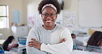 African teacher, woman and arms crossed with face, smile or education in class at school. Person, excited and pride in portrait fir career by kids for learning, scholarship and test for development