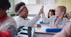 Classroom, high five and teacher with girl for help in lesson, maths skills and learning for assessment. Education, school and woman with kids counting numbers for teaching, development and knowledge