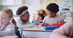 School, maths and teacher help student in classroom for learning, assignment and numbers lesson. Education, teaching and woman explain to boy for question, development and studying for assessment