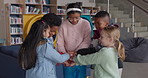 Group, school kids and circle with hands stack for motivation, diversity and support for education. Girl, boy and children with teamwork, connection and learning together for development at academy