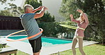 Fitness, hula hoop and senior couple in garden for workout, training or retirement health. Wellness, happy man and elderly woman with equipment for exercise, cardio or hip mobility in backyard