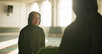 Teaching, book and group of women in mosque for worship, spiritual inclusion or Islamic study together. Culture, support and happy female students with Quran, learning and solidarity in Muslim prayer