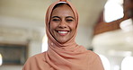 Muslim woman, face and happy in mosque for religion, faith or connection to God in Qatar. Person, hijab and smile with Islam for spiritual development in temple for pilgrimage, devotion or gratitude