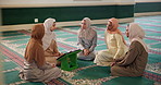 Quran, class and group of women in mosque for worship, spiritual inclusion or holy prayer to Allah. Culture, learning and Muslim girl school with discussion, book and solidarity in Islamic religion