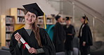 Happy girl, graduation and student with certificate for qualification, future or milestone at campus. Portrait of female person or young graduate with smile for diploma, degree or award at university