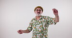 Dance, music and senior man in studio on white background for fun retirement, moving and rhythm. Party, celebration and funky fashion with happy elderly person dancing on mockup backdrop for freedom