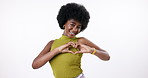 Afro, hands in heart and face of black woman in studio for beauty, natural hair and salon care on white background. Emoji, dance and portrait of isolated person with cosmetics, love sign or shape