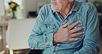 Senior, man and hand with chest pain, heart attack or ache in hypertension or cardiovascular disease at home. Closeup of elderly male person with cardiac arrest, arrhythmia or symptoms at house