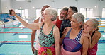 Senior people, group smile and selfie for social media, retirement and memory by swimming pool. Elderly friends, happy and profile picture in indoor arena for aquatic training, swim class and health