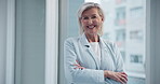 Businesswoman, arms crossed and happy portrait for ceo in office with pride for career or company. Senior professional, leadership or management in workplace and smile for investment in New York