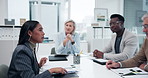 Diverse group, meeting and woman speaker in office for financial planning, budget and strategy for company growth. Female advisor, proposal and talking at table for presentation, ideas and feedback