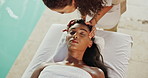 Calm woman, relax and facial with massage above for spa day, stress relief or beauty at outdoor resort. Top view of female person with masseuse in relaxation for luxury, wellness or therapy treatment