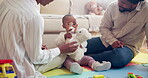 Mom, dad and baby in lounge for toys, games or fun and development for motor skills in home. Parents, teddy bear and child in living room for play, weekend and together for support, love and growth