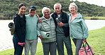 Woman, fitness coach and senior people with face, hug and happy on grass by river with exercise mat. Elderly group, support and outdoor with embrace for training, workout and wellness in retirement