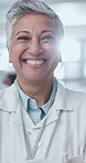 Face, doctor and woman with arms crossed, smile and healthcare with confidence in clinic. Portrait, mature person and employee with pride, medical and professional with career ambition and cardiology