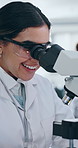 Scientist, microscope and lab for medical research, science or specimen for pharmaceutical or medicine. Woman, equipment and tech for innovation in healthcare, pathology with happy for test results