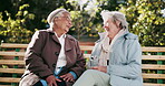 Bench, conversation and laughing with old women in park together for bonding or retirement. Funny, relax and smile with senior friends talking outdoor in garden or nature for community or wellness