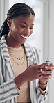 Laughing, black woman and scroll with cellphone in office for communication, social media and funny meme, Happy, female person and mobile for reading comic joke, video and streaming news on website