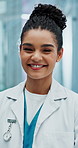 Woman, doctor and smile with portrait for healthcare, closeup and clinic in hospital. Medicine, professional and surgeon for female person, medical and face for pride and help service for patient