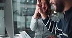 Business, employees and happy with high five on computer or document with graphs for financial reports or review. People, teamwork and collaboration for project success and achievement at office