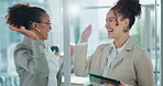 High five, consult and business people with tablet in office for investment, review and good news. Corporate, women and partnership with tech in discussion for finance, success or stock market growth