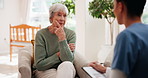 Home, old woman and nurse with clipboard, healthcare and wellness with consultation, retirement and talking. Document, professional or medical with patient, checkup and paperwork for disease or sick