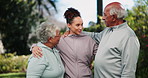 Fitness, senior couple and coach outdoor in nature for help, support or talk after exercise. Personal trainer, elderly man and woman at garden for hug, wellness or physical therapy for healthy body