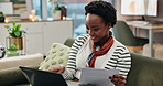 Black woman, laptop and paperwork for tax, smile and reading with digital admin for compliance in home. Person, computer and documentation with typing, information and budget for finance in apartment