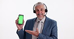 Studio, man face and green screen on mobile for call center, sign up and advice for customer service. Telemarketing, mature agent or mic for business crm, FAQ question or about us by white background