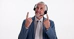Mature man, headset and pointing up for choice, selection or decision for announcement in studio background, Male person, microphone and excited in promotion, advertising and mockup space for logo