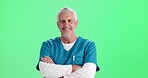 Doctor, man and confident with face on green screen for advertising medical practice, insurance and healthcare. Mature, person and arms crossed in studio for pride in career as General practitioner.