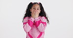 Girl, surprise and hands on mouth in studio with face, shock and announcement by white background. Child, wow and portrait for gossip, news and emoji for secret with excited expression in Colombia