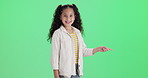 Pointing, checklist and face of child on green screen for options, decision and selection in studio. Excited, happy and portrait of young girl with info, announcement and news on chromakey background