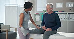 Physiotherapist, rehabilitation and leg of mature man in clinic for wellness, physiotherapy and exercise. Senior person, massage and stretching knee with osteoporosis, sciatica or stroke for health